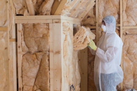 A man using protective device in an asbestos environment