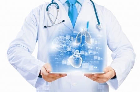 A doctor holding an hologram of the heart, brain and kidney