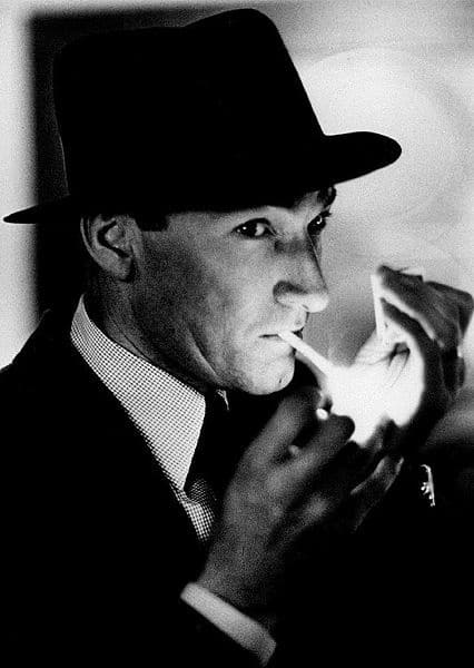 A man lighting a cigarette