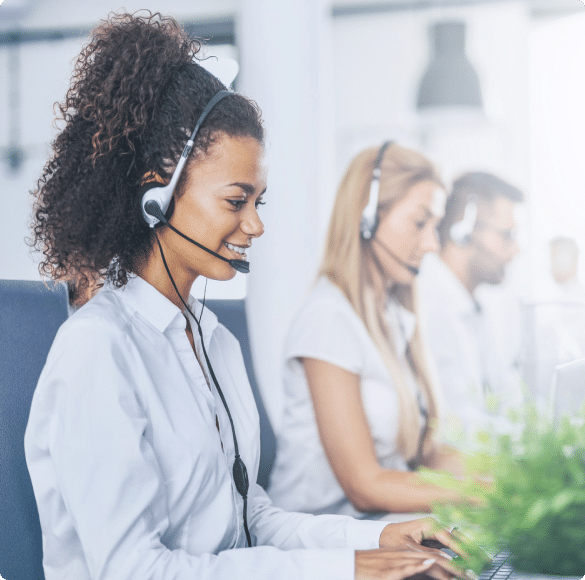 A customer assistant attending to a client with headphones on