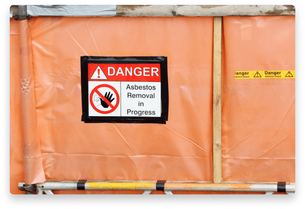 Danger: Asbestos Removal in Progress sign post