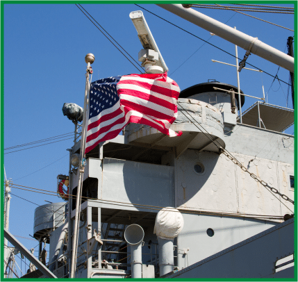 close up of a US flag on a navy ship